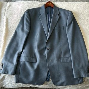 Ralph Lauren sports coat. 2 button, silk lined, lighter blue in size 44L